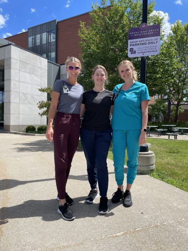 A group of staff members heading out on a walk